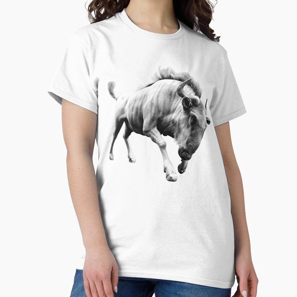 Charging Wildebeest – Black & White Wildlife Portrait by Massimo Righi