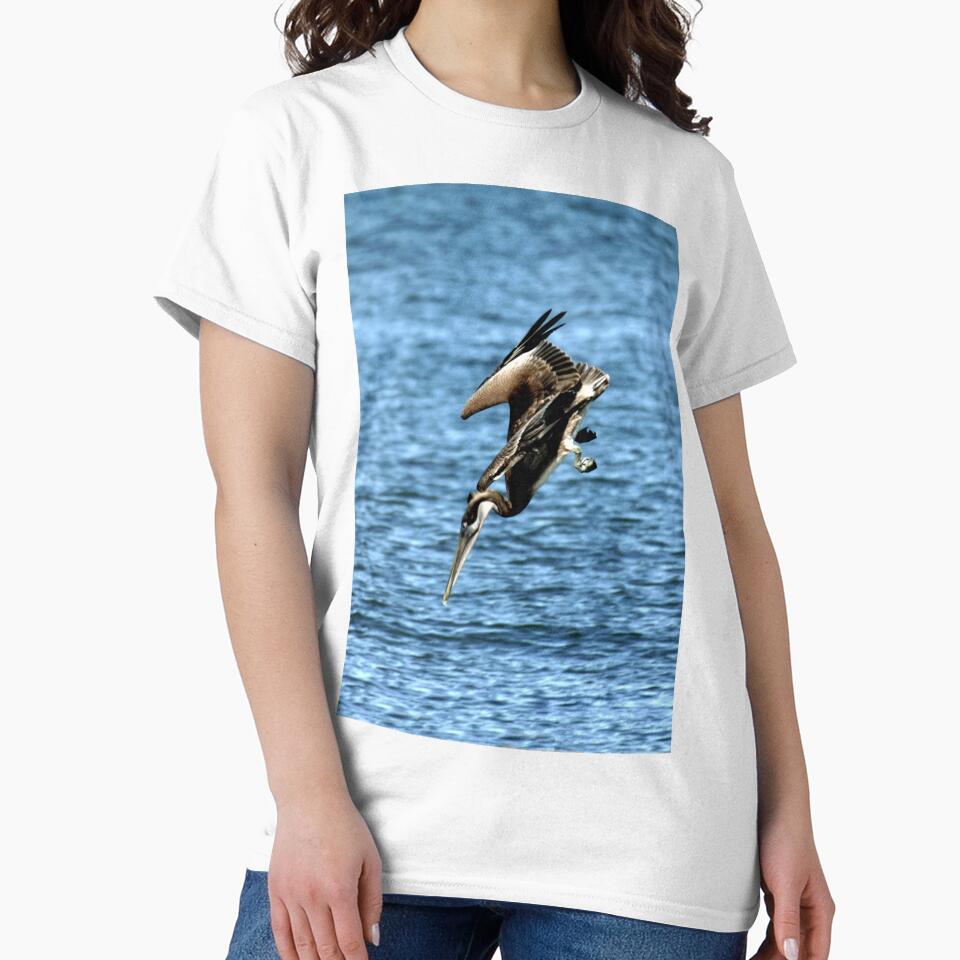 DIVING BROWN PELICAN by TomBaumker