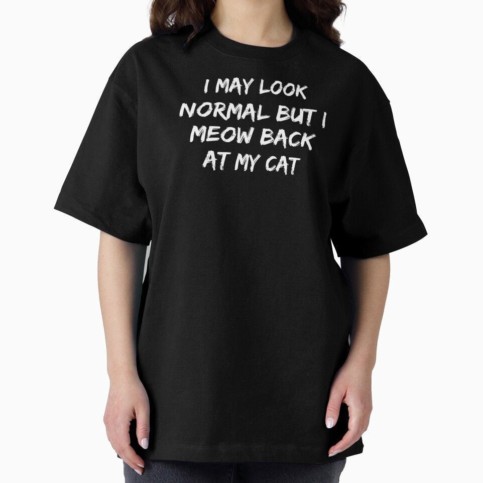 I may look normal but I meow back at my cat by Prima Taftajani